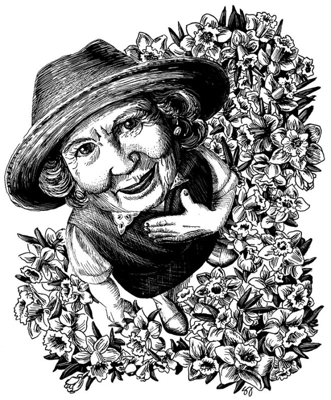 older female gardener standing in flowers touching heart